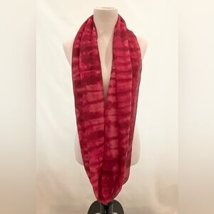 Tie-die infinity scarf in variations of fuchsia.